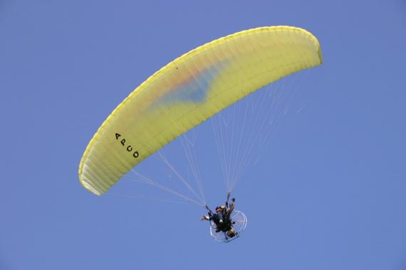 Tandem motor paraglider experience! View Furano from above